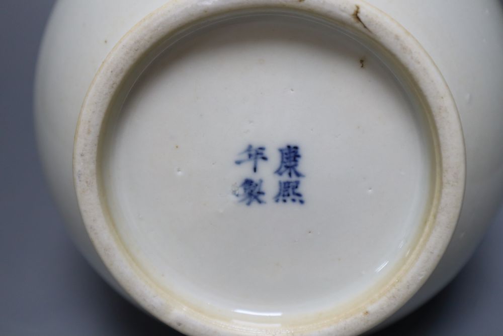 A Chinese porcelain blue and white bottle vase, painted with dragons in underglaze blue
